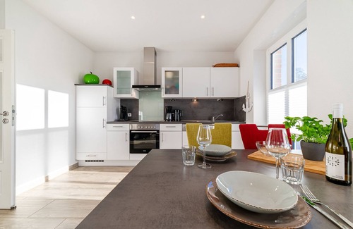 Greetsiel Apartamento | Sonnenseite: Moderne Ferienwohnung für Ihren Perfekten Urlaub