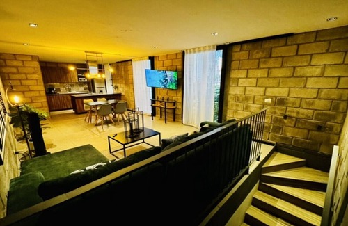 Downtown Guadalajara Apartamento | Sofisticado loft con gimnasio y zona de coworking exclusiva