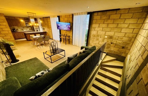 Downtown Guadalajara Apartamento | Sofisticado loft con gimnasio y zona de coworking exclusiva