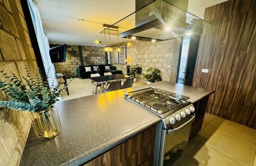 Downtown Guadalajara Apartamento | Sofisticado loft con gimnasio y zona de coworking exclusiva