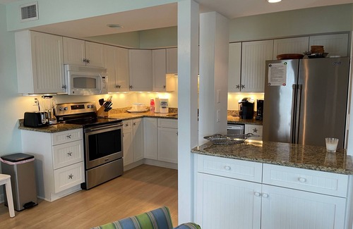 Wrightsville Beach Condominio | ¡Ubicación!Frente de sonido, vista al mar, muelle privado y estilo caribeño