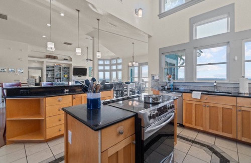 Wind Over Waves Casa | Soundfront, Pool, Hot Tub, Elevator, Private Dock, Boat Ramp, & Game Room