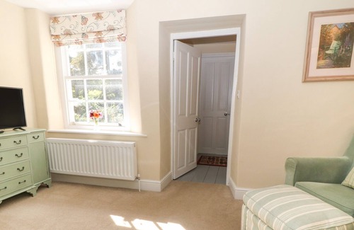Rumleigh Cabaña | SOUTH WING COTTAGE, pet friendly, with a garden in Bere Alston