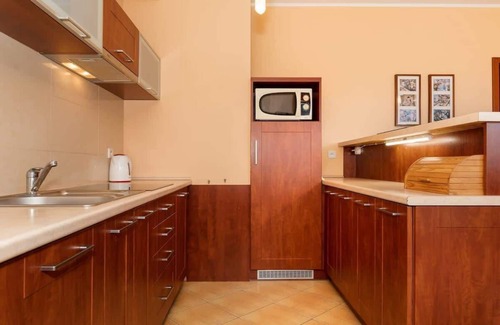 West Pomeranian Voivodeship Apartamento | Apartamento Spacerowa 2/604 con dormitorio y balcón.