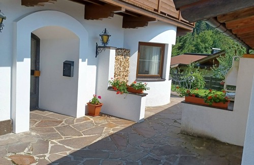 Scheffau am Wilden Kaiser Apartamento | Spacious vacation apartment with fireplace + children's play corner, 10 + 2 persons