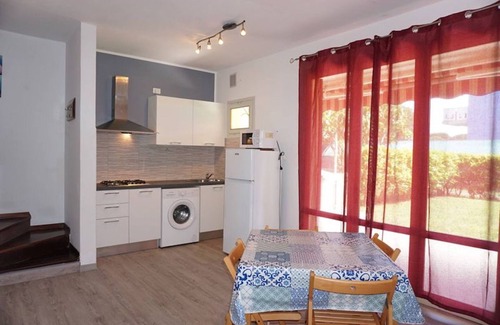 Porto Santa Margherita Villa | Amplia villa con jardín privado y piscina compartida.