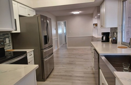 Highland Casa | Spacious 3-bedroom house with HOT TUB and MOVIE THEATRE 8 minutes from RACEWAY
