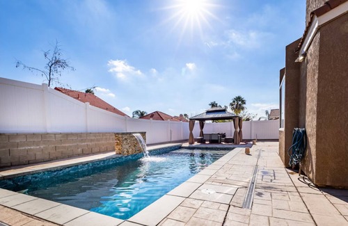 Moreno Valley Casa | Spacious 4-bedroom house in tranquil Moreno Valley with AC