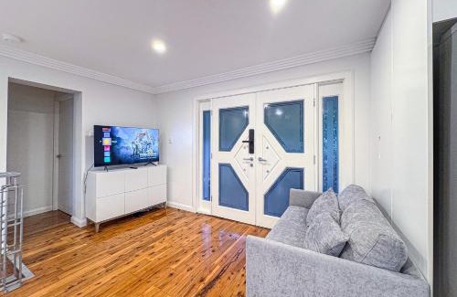 West Ryde Apartamento | Spacious 4-bedrooms apartment in West Ryde with WiFi, AC
