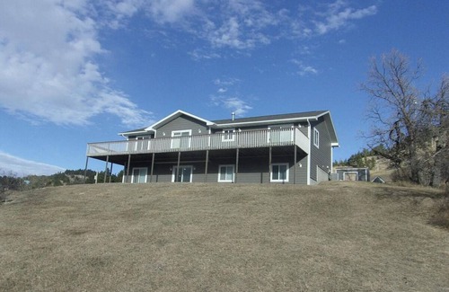 Sturgis Casa | Spacious 5-Bedroom Home Blocks away from Downtown nestled in Below STURGIS Sign