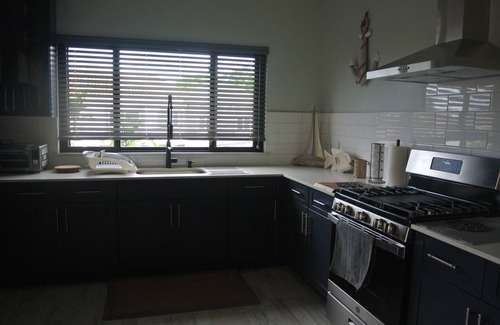 Tower Isle Casa | Spacious 6-bedroom house with WiFi and AC in charming St. Mary Parish