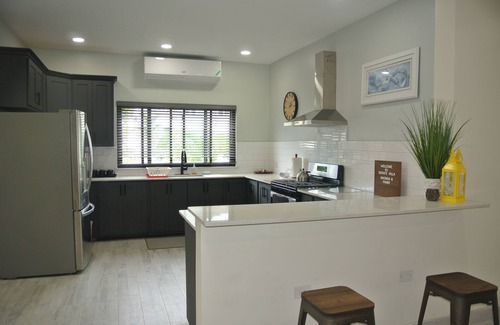 Tower Isle Casa | Spacious 6-bedroom house with WiFi and AC in charming St. Mary Parish