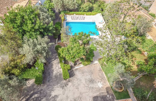 Puerto de Soller Apartamento | Acogedor apartamento con piscina comunitaria e impresionantes vistas al mar