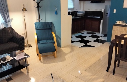 Tawala Apartamento | Spacious apartment with separate toilet, sofa bed in living room.