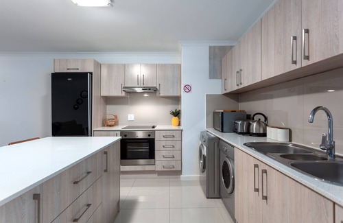 Big Bay Apartamento | Apartamento espacioso en la playa - Salte y salte desde Blouberg Beachfront