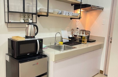 Novaliches Condominio | Spacious Comfort: Two bedrooms & large living space ideal for families friends