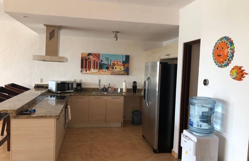 Puerto Aventuras Condominio | Amplio condominio con impresionantes vistas al mar