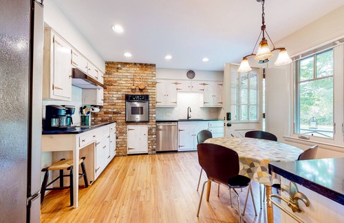 Flat Rock Casa | Spacious country home with firepit, patio, foosball, amazing views, & W/D
