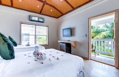 Placencia Complejo | Spacious Double Room w/ WiFi, Jacuzzi Tub, & Mini Bar