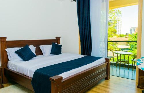 Thompson Estate Apartamento | spacious executive two bedroom apartments with breathtaking city views swimming pool ,well equipped gym ,child playground and ample parking space
