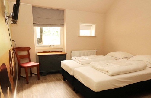 Tweede Exloermond Otro | Amplia casa de campo en Tweede Exloërmond con patio
