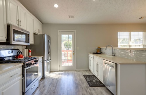 Riverdale Casa | Spacious Georgia Home w/ Deck, Grills & Fireplace!