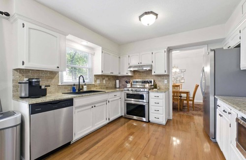 Overland Park Casa | Large Home in OP Fenced Yard King Beds GameRoom