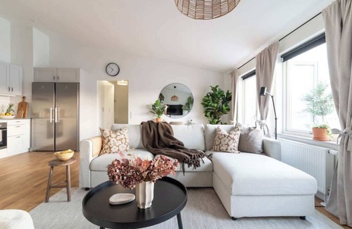 Bastad Condominio | Spacious Home with Workspace and Cozy Balcony