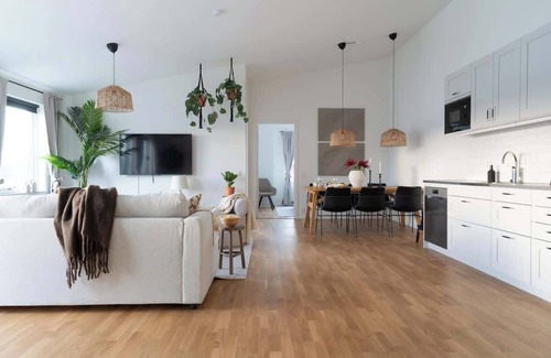 Bastad Condominio | Spacious Home with Workspace and Cozy Balcony