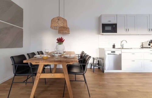 Bastad Condominio | Spacious Home with Workspace and Cozy Balcony