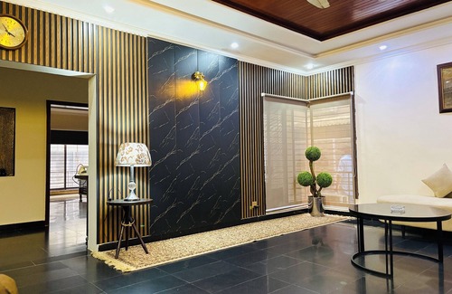 Lahore Casa | “Spacious King Rooms Prime DHA Location Perfect for Business & Family Stays