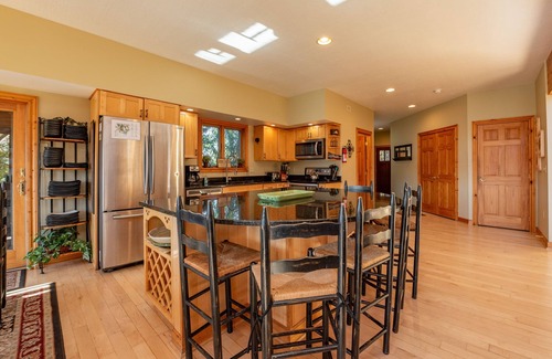 Waterfront Greens Casa | Spacious Lake Escape w/ Hot Tub, Dock & Fireplace