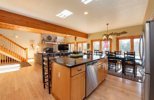 Waterfront Greens Casa | Spacious Lake Escape w/ Hot Tub, Dock & Fireplace