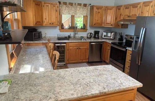 Farmington Casa | Spacious lakefront home with 5 bedrooms & hot tub!