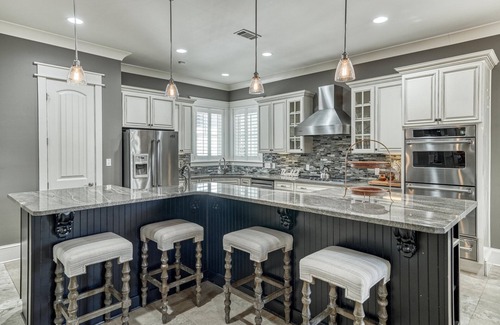 Sugarwood Beach Casa | Spacious Layout with Heated Pool, Fire Pit, Golf Cart, Bikes, and Carriage House