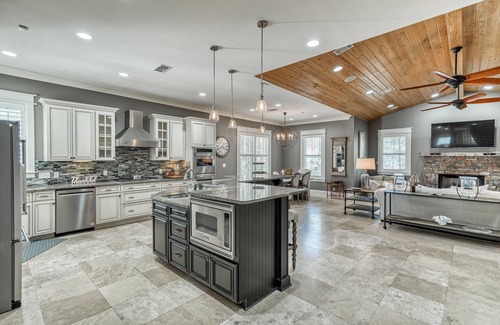 Sugarwood Beach Casa | Spacious Layout with Heated Pool, Fire Pit, Golf Cart, Bikes, and Carriage House