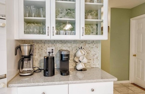 Stroudsburg Casa | Spacious luxury home with a large private backyard, seasonal in-ground pool, and year-round sauna an