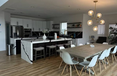 April Sound Casa | Spacious Luxury Lakefront Home with Pool and Jacuzzi, Firepit, and Game Room!