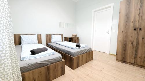 Erdberg Casa | Spacious Rooms - 15 Min from Airport & City Center, 5 Min from Vienna Main-Bus Station EZ9