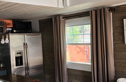 Wilmington Cabaña | Spacious two level cottage with pool, patio and hot tub