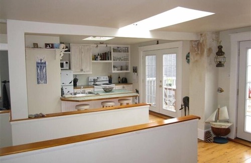 Lunenburg Waterfront Apartamento | Espectacular Loft con vista al mar con vista al puerto de Lunenburg en el corazón de la ciudad