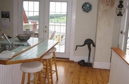 Lunenburg Waterfront Apartamento | Espectacular Loft con vista al mar con vista al puerto de Lunenburg en el corazón de la ciudad
