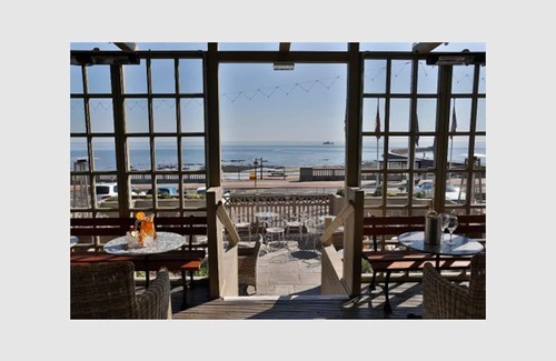 Roker Apartamento | Vistas espectaculares de la playa, el mar, el muelle y el faro.