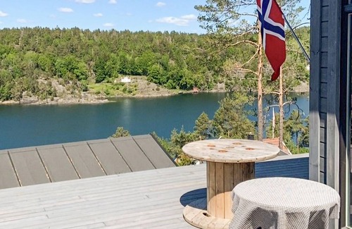 Kragero Casa | Spend an idyllic island vacation in this enchanting vacation home by the fjord.
