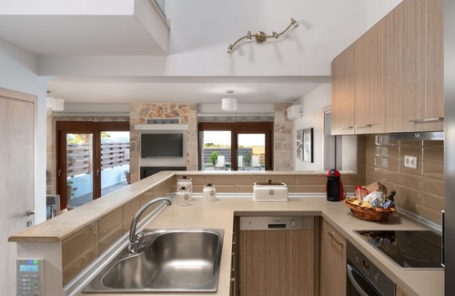 Afandou Villa | Sperveri Enalio Villas - Casa de piedra con vistas al mar Villa con una gran piscina privada