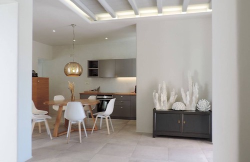 Tourlos Villa | Splendid Mykonos Villa | Villa Ravenclaw | 4 Bedrooms | Breathtaking Sea Views | Spacious Furnished Sun Terrace | Private Outdoor Hot Tub | Shaded Outdoor Dining Area | Agia Sofia, Tourlos