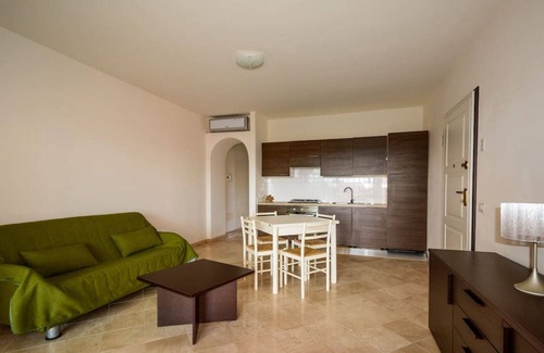Porto Pozzo Apartamento | Espléndido apartamento con vistas al mar (N ° 20)