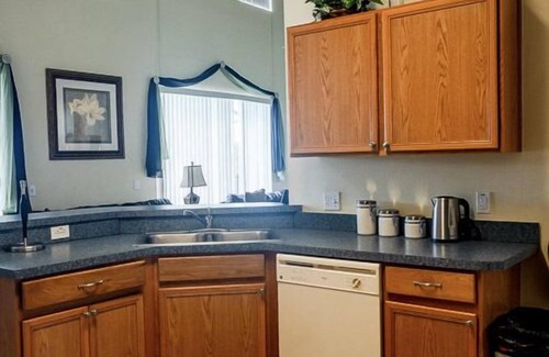 Crescent Lakes Villa | Sprawling Private Pool Home near Disney w/ Pond Views & Game Room