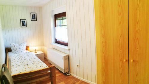 Zutzen Casa | Spreewälder Schwalbenhof - Ferienhaus "Schwalbennest"