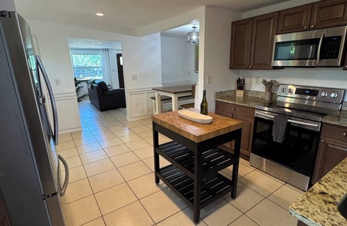 St. Petersburg - Clearwater Casa | 20% Off NEW 4BR Poolside Tampa Gem w/ Private Gym!